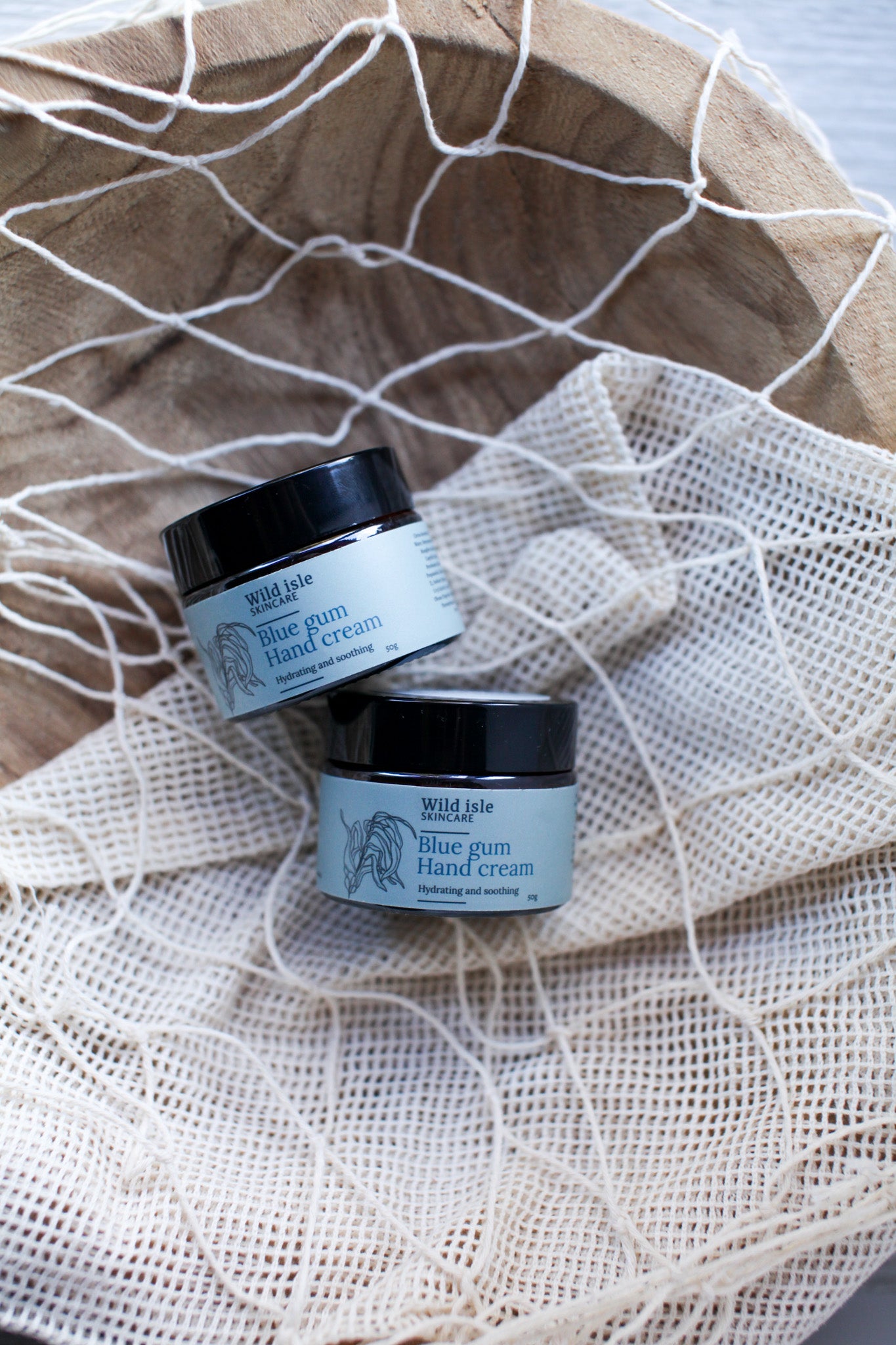 Two jars of Blue Gum Hand Cream on a wild isle skincare